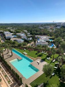 Basen w obiekcie Las Colinas Golf - Naranjo 60 Penthouse lub w pobliżu
