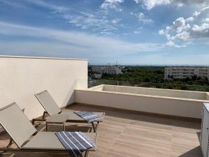 Balkon lub taras w obiekcie Las Colinas Golf - Naranjo 60 Penthouse