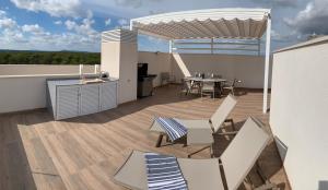 Balkon lub taras w obiekcie Las Colinas Golf - Naranjo 60 Penthouse