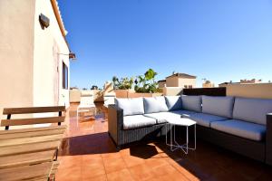 Posedenie v ubytovaní Marinas Sunset - Tu Dúplex con Solarium Privado!