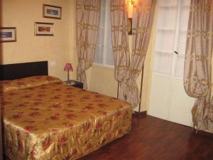 Postel nebo postele na pokoji v ubytování Residenza Tre Marchetti