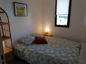 Postel nebo postele na pokoji v ubytování La Grande Bleue