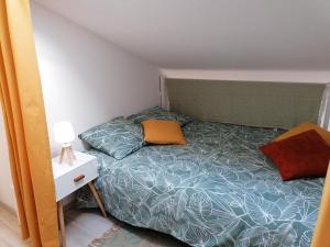 Postel nebo postele na pokoji v ubytování La Grande Bleue