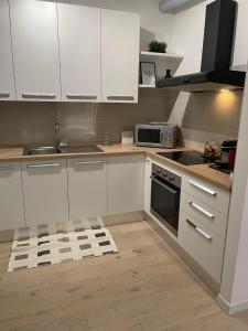 Η κουζίνα ή μικρή κουζίνα στο HOUSE RODRIGUEZ +4 φωτογραφίες