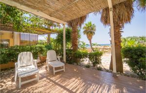 Κήπος έξω από το 3 Bedroom Awesome Home In Menfi