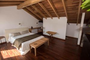 Posteľ alebo postele v izbe v ubytovaní Refugio playa Caldebarcos
