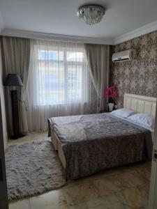 A bed or beds in a room at Barbaros Cd no 201 Апартаменты
