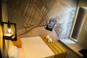 Cama ou camas em um quarto em Dy Viajero Transient Hotel