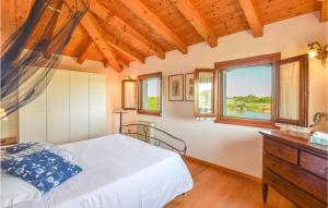 A bed or beds in a room at Porta Di Valle 1