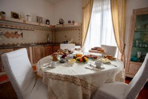 a table with a plate of food on it at A due passi olbia in Olbia +102 photos