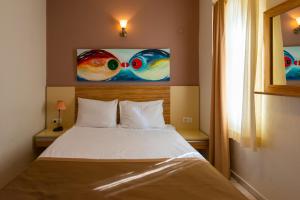 Vira Suites Hotel客房内的一张或多张床位