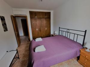 Кровать или кровати в номере Cala Mesquida
