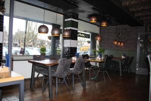 Restavracija oz. druge možnosti za prehrano v nastanitvi Hotel Restaurant de Jonge Heertjes