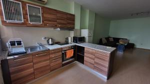 Η κουζίνα ή μικρή κουζίνα στο Minimalistic 1BR flat with a Parking spot