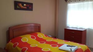Postel nebo postele na pokoji v ubytování Hostal La Casona