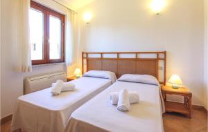 Posteľ alebo postele v izbe v ubytovaní Beautiful Home In Costa Rei -Ca-