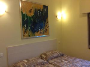 Voodi või voodid majutusasutuse Cadorna Chalet toas