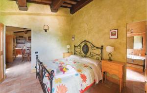 A bed or beds in a room at Podere Giovannini