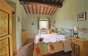 A bed or beds in a room at Podere Giovannini