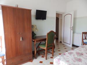 Postel nebo postele na pokoji v ubytování Sa Chessa B&B