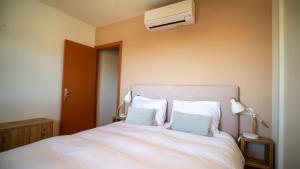 Postel nebo postele na pokoji v ubytování Albirelax