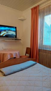 Ein Bett oder Betten in einem Zimmer der Unterkunft Fremdenzimmer Familie Förster