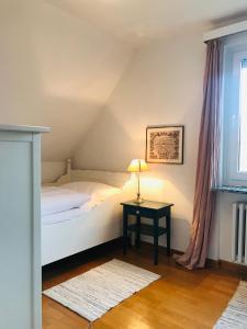 Postel nebo postele na pokoji v ubytování Haus Tütje