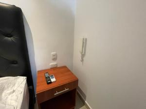 Hotel Aeromar Central客房内的一张或多张床位