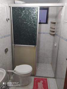 Et badeværelse på Residencial Avila Frente Ao Mar
