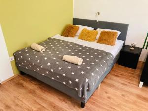 Postel nebo postele na pokoji v ubytování Like Apartman