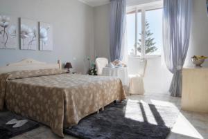 Letto o letti in una camera di Hotel Mediterraneo