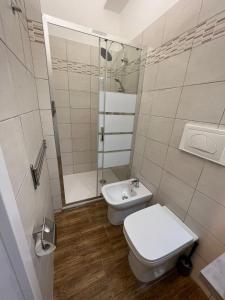 Koupelna v ubytování Bergamoincity