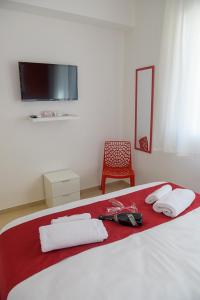Postel nebo postele na pokoji v ubytování Corallo Rosso B&B