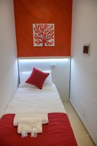 Postel nebo postele na pokoji v ubytování Corallo Rosso B&B