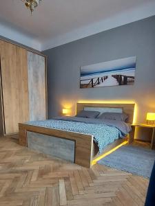 Кровать или кровати в номере Apartments by PA