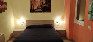 Postel nebo postele na pokoji v ubytování Villa ARA rossa