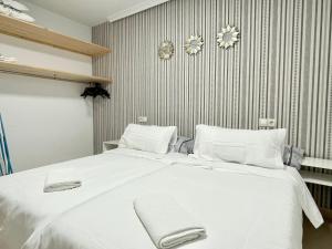 Postel nebo postele na pokoji v ubytování Payma Apartments Benidorm