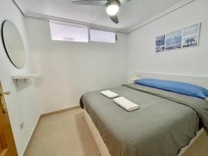 Postel nebo postele na pokoji v ubytování Payma Apartments Benidorm