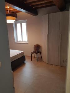 Łóżko lub łóżka w pokoju w obiekcie Agriturismo Villa al piano
