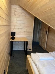 Posteľ alebo postele v izbe v ubytovaní Apartament Jeleń Łoś Niedźwiedź