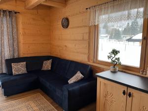 Posedenie v ubytovaní Apartament Jeleń Łoś Niedźwiedź
