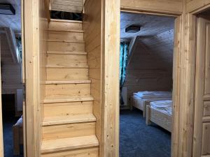 Posteľ alebo postele v izbe v ubytovaní Apartament Jeleń Łoś Niedźwiedź