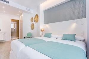 Łóżko lub łóżka w pokoju w obiekcie Espectacular casa de 6 dormitorios, 7 banos y 2 terrazas