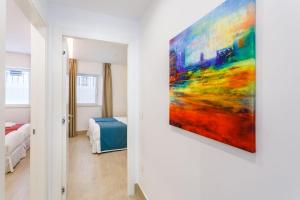 Łóżko lub łóżka w pokoju w obiekcie Espectacular casa de 6 dormitorios, 7 banos y 2 terrazas