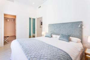 Łóżko lub łóżka w pokoju w obiekcie Espectacular casa de 6 dormitorios, 7 banos y 2 terrazas