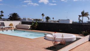 Bazén v ubytování Villa Sunset Faro Deluxe & Spa Pool nebo v jeho okolí