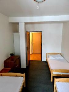 Postel nebo postele na pokoji v ubytování Penzion Gerle + 19 fotografií