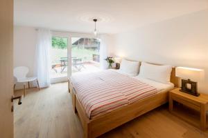 Postel nebo postele na pokoji v ubytování Casa delle Stelle by Zermatt Premium Apartments