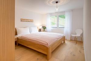 Postel nebo postele na pokoji v ubytování Casa delle Stelle by Zermatt Premium Apartments