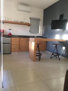 Kuchyň nebo kuchyňský kout v ubytování Suites Cervantes